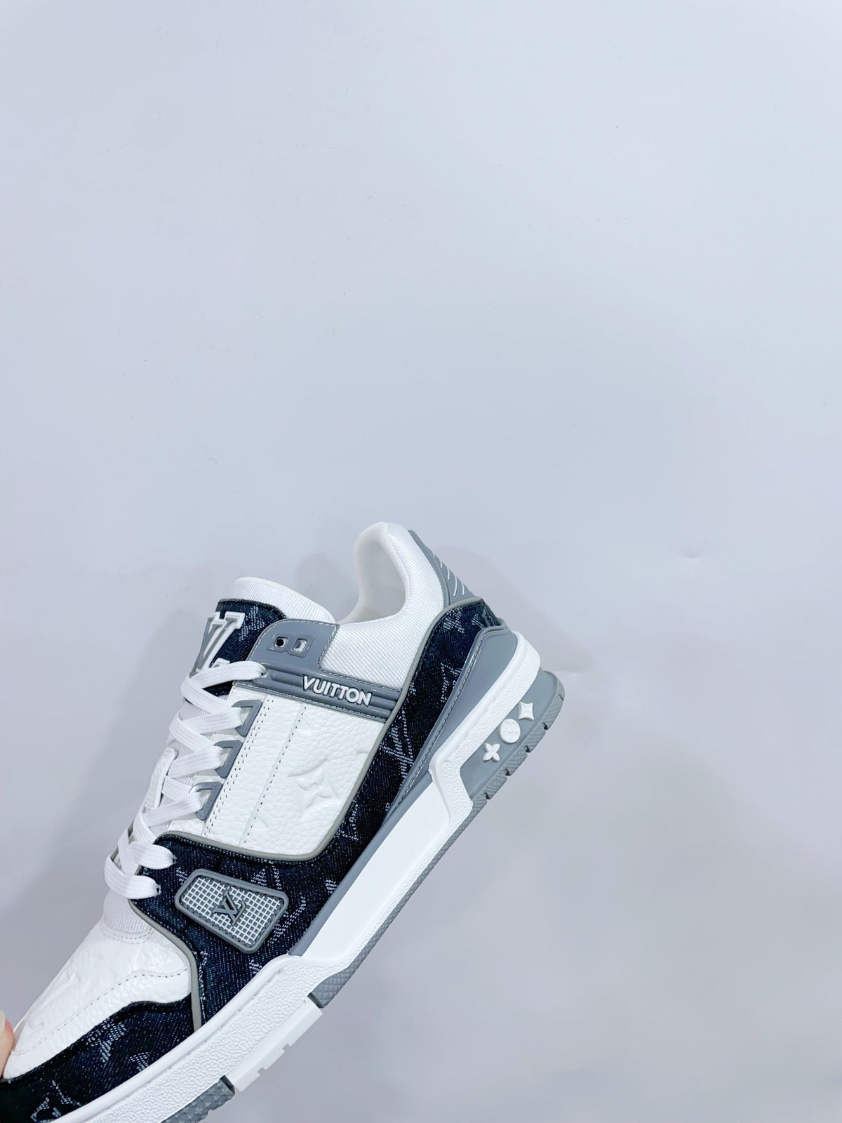 LV TRAINER SNEAKER IN WHITE CALFSKIN AND BLACK MONOGRAM DENIM