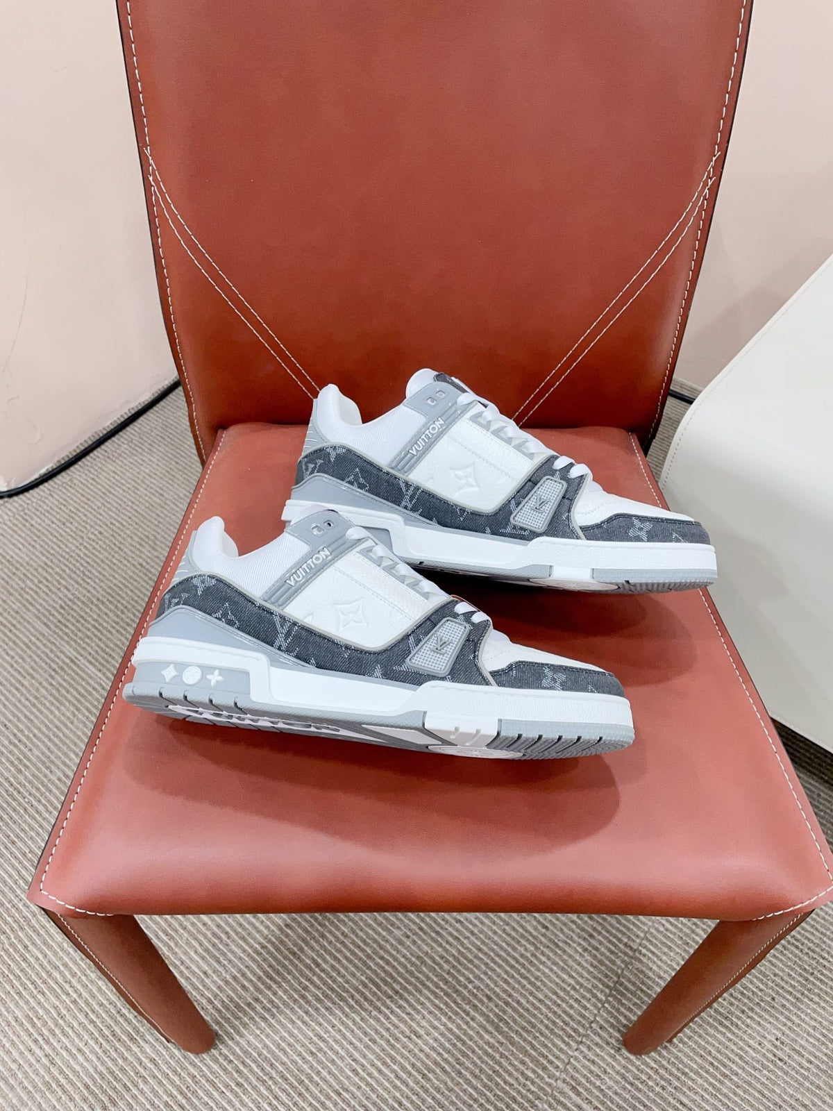 LV TRAINER SNEAKER IN WHITE CALFSKIN AND BLACK MONOGRAM DENIM