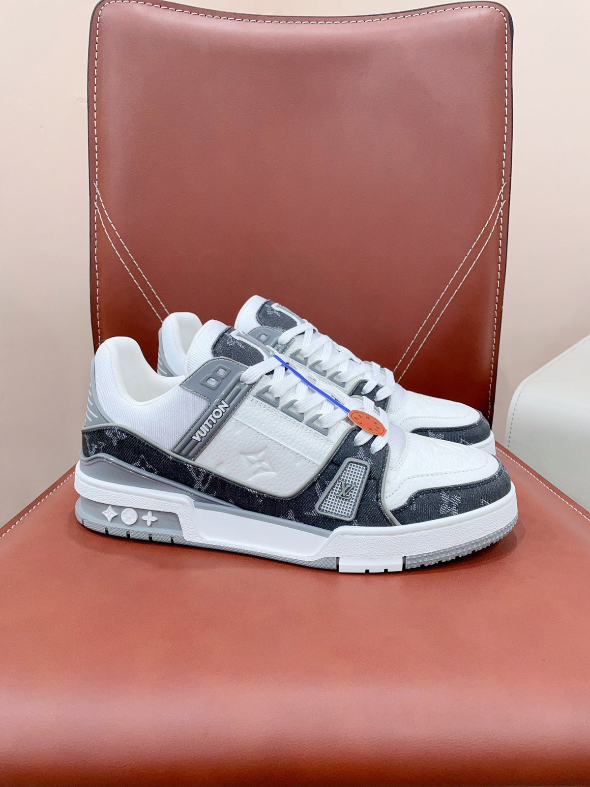 LV TRAINER SNEAKER IN WHITE CALFSKIN AND BLACK MONOGRAM DENIM