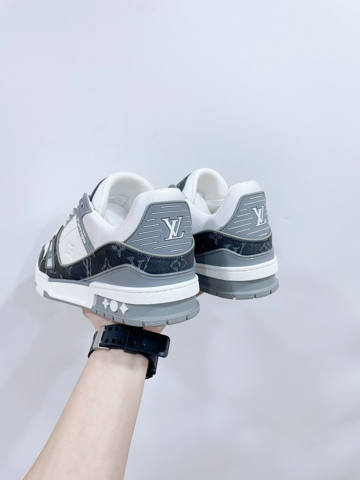 LV TRAINER SNEAKER IN WHITE CALFSKIN AND BLACK MONOGRAM DENIM