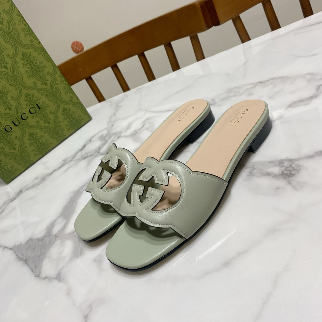 INTERLOCKING G SLIDE SANDAL IN PASTEL GREEN AND BEIGE CALFSKIN