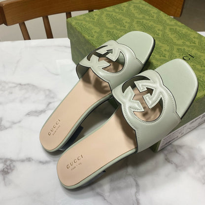 INTERLOCKING G SLIDE SANDAL IN PASTEL GREEN AND BEIGE CALFSKIN