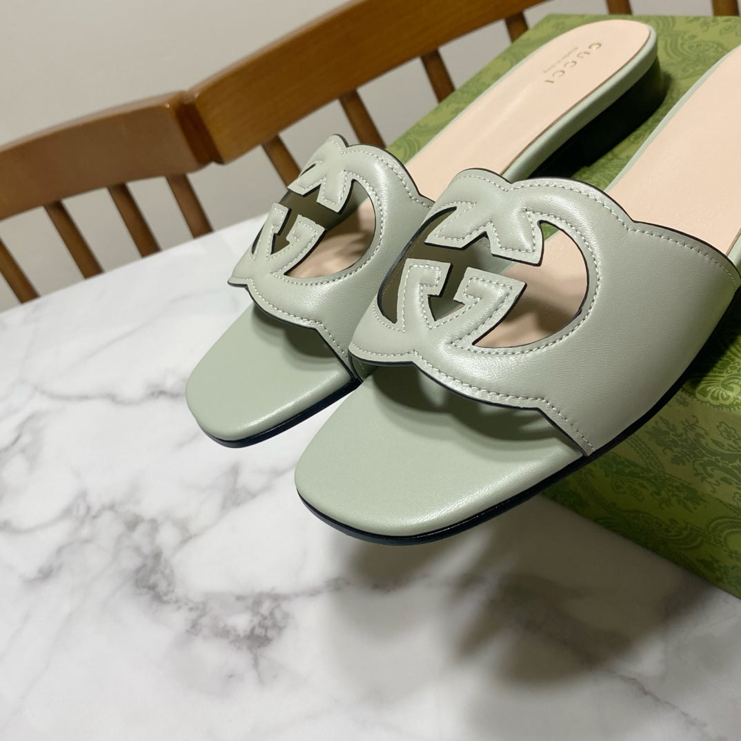 INTERLOCKING G SLIDE SANDAL IN PASTEL GREEN AND BEIGE CALFSKIN