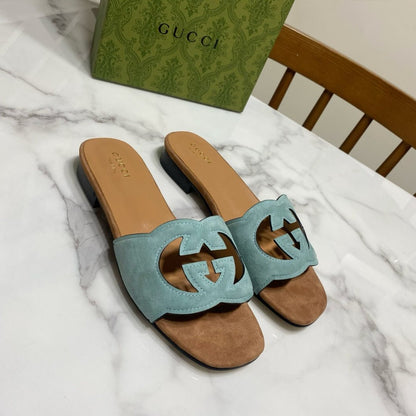 INTERLOCKING G SLIDE SANDAL IN MORNING BLUE SUEDE AND BROWN SHEEPSKIN LINING