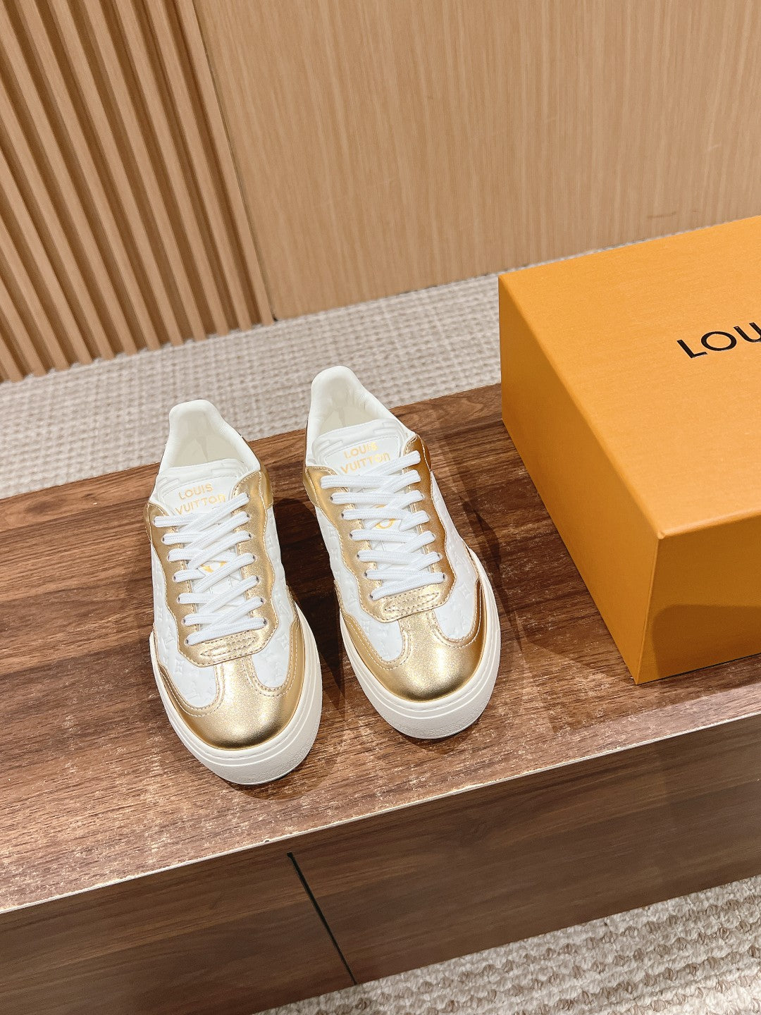 LV TRAINER SNEAKER IN GOLD MIX WHITE EMBOSSED CALFSKIN