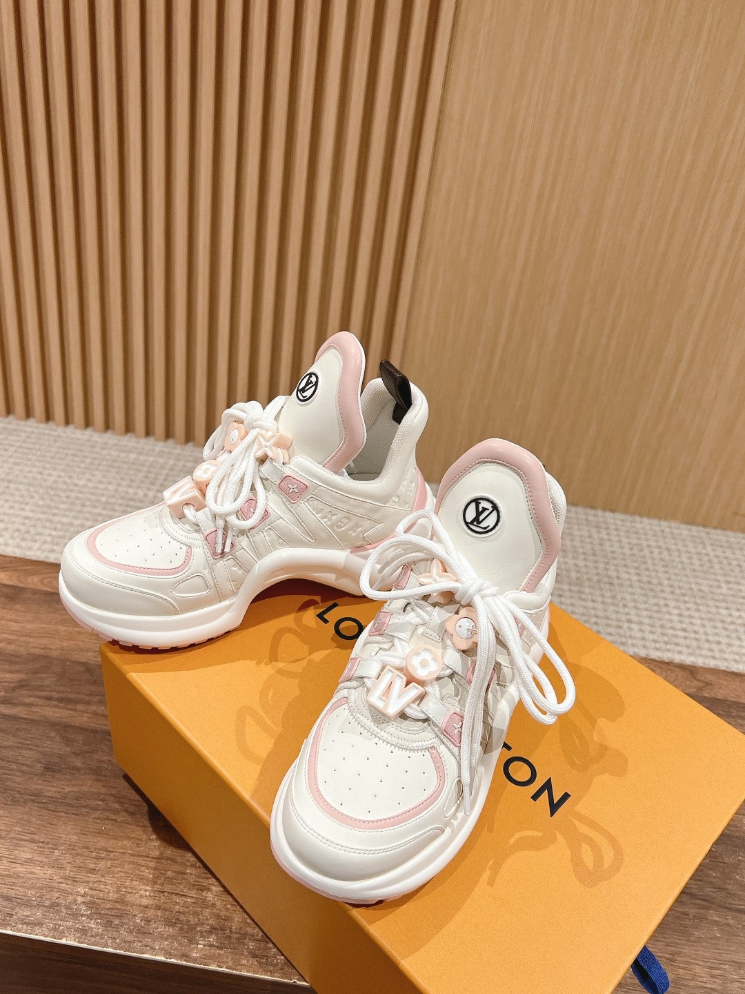 LV ARCHLIGHT SNEAKER IN WHITE MIX LIGHT PINK EMBOSSED CALFSKIN