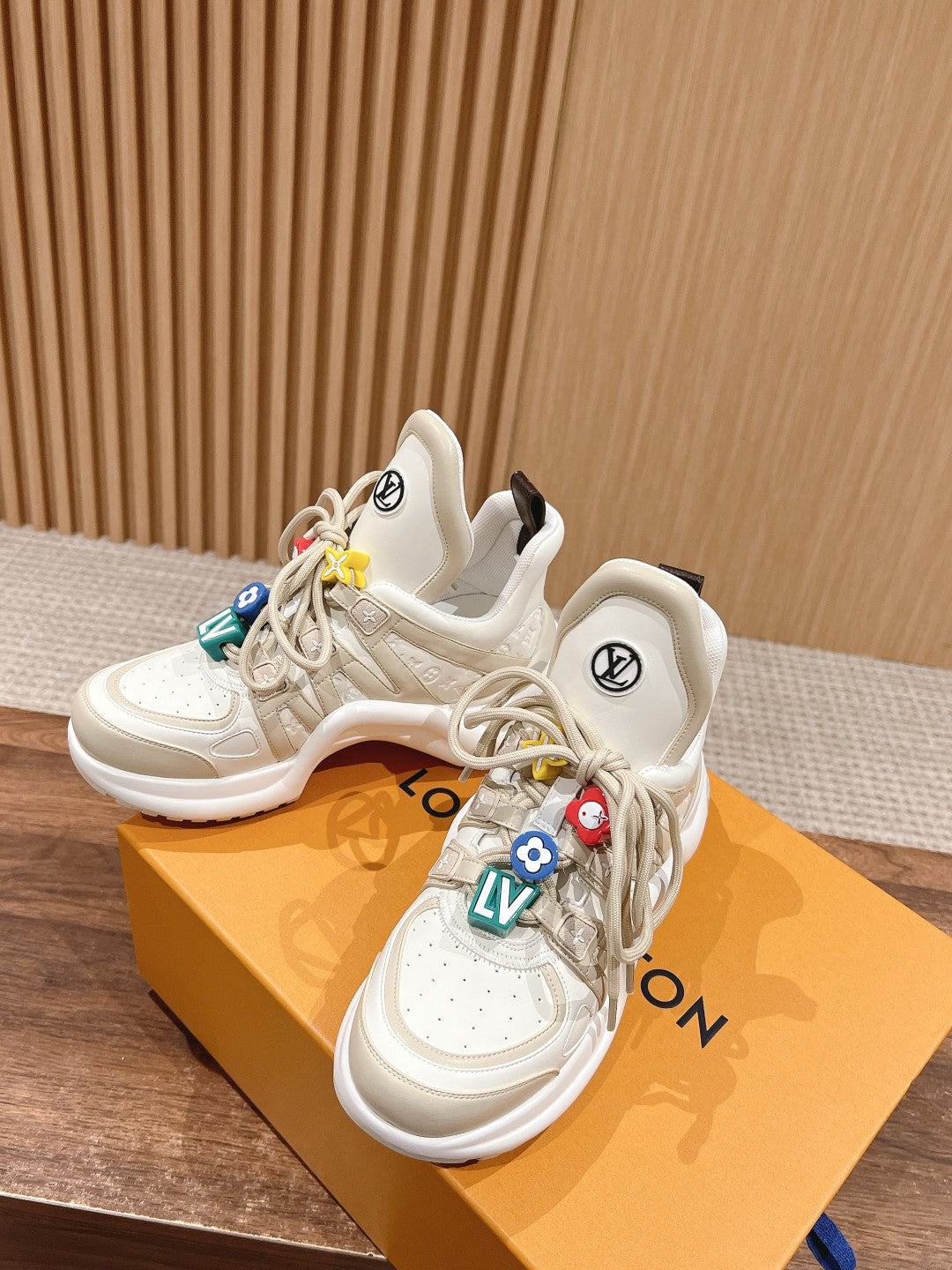 LV ARCHLIGHT SNEAKER IN BLANC BEIGE EMBOSSED CALFSKIN