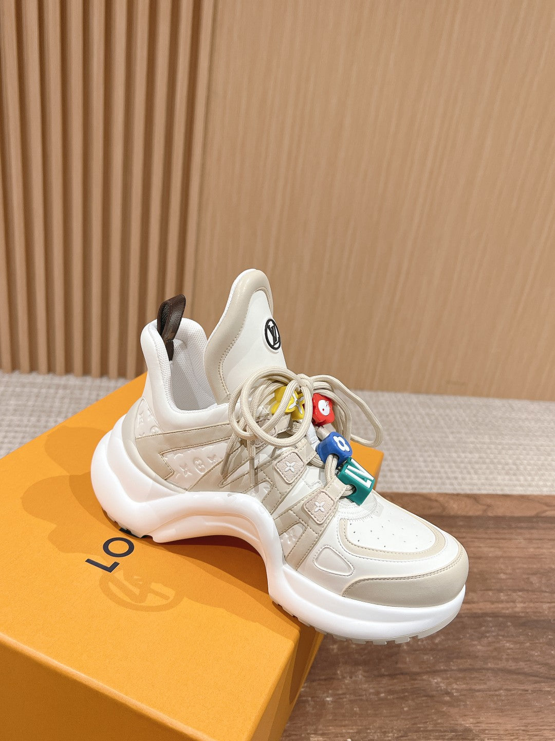 LV ARCHLIGHT SNEAKER IN BLANC BEIGE EMBOSSED CALFSKIN