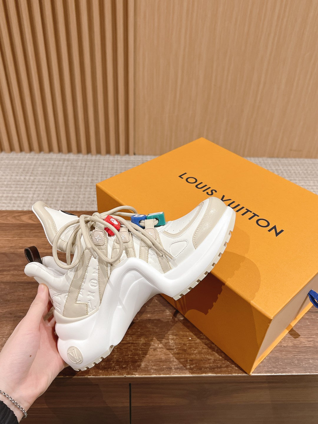 LV ARCHLIGHT SNEAKER IN BLANC BEIGE EMBOSSED CALFSKIN