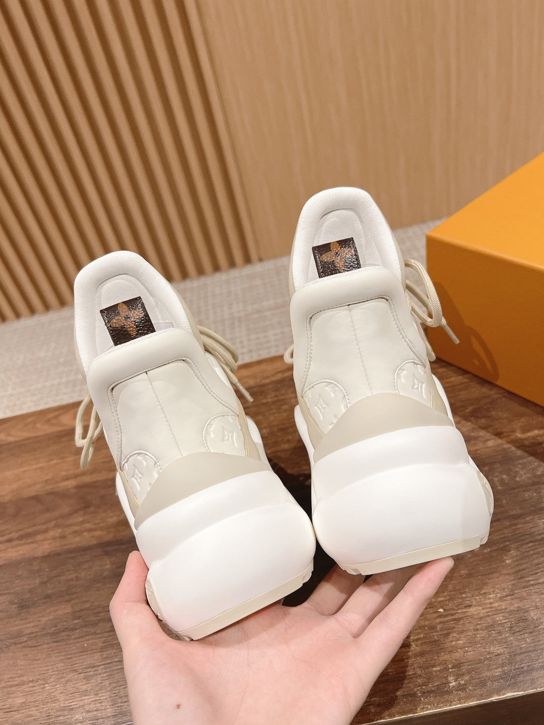 LV ARCHLIGHT SNEAKER IN BLANC BEIGE EMBOSSED CALFSKIN