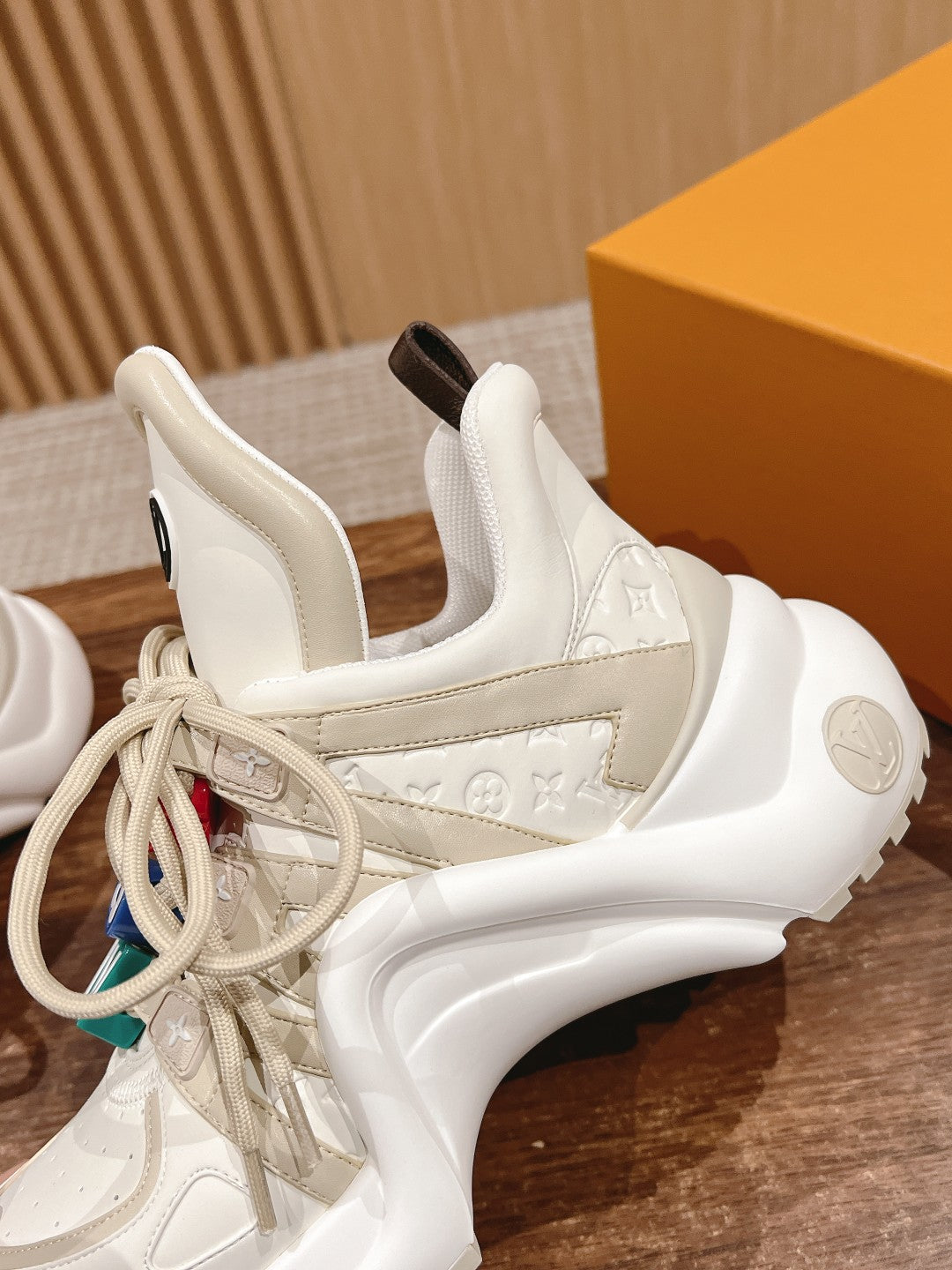 LV ARCHLIGHT SNEAKER IN BLANC BEIGE EMBOSSED CALFSKIN