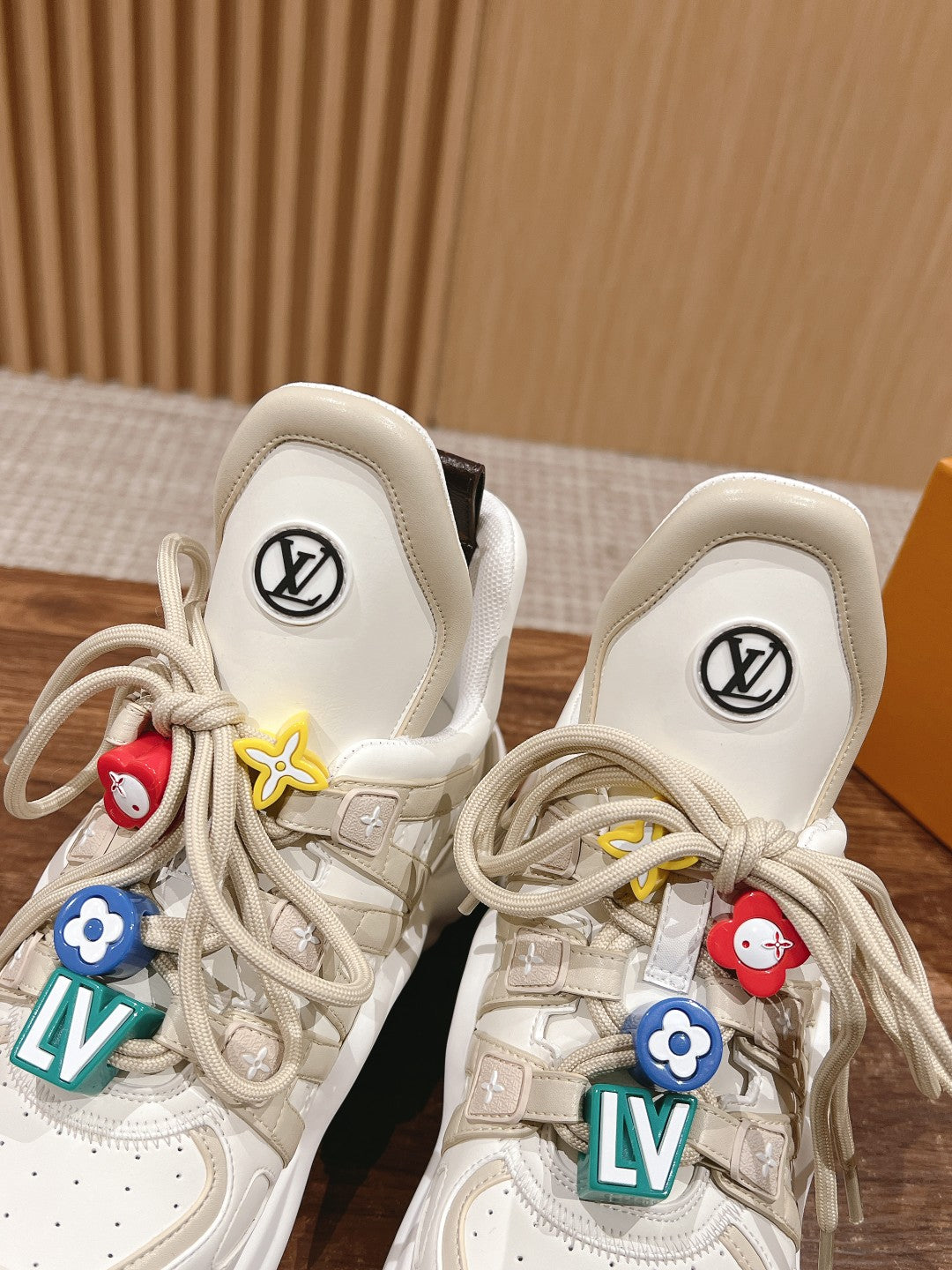LV ARCHLIGHT SNEAKER IN BLANC BEIGE EMBOSSED CALFSKIN