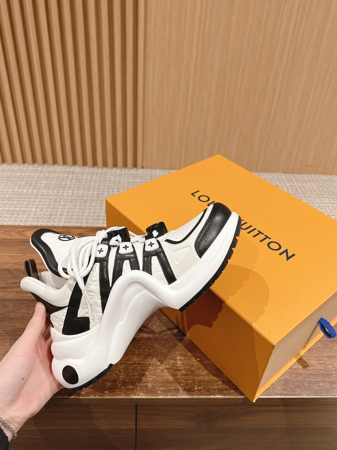 LV ARCHLIGHT SNEAKER IN WHITE MIX BLACK EMBOSSED CALFSKIN 101058