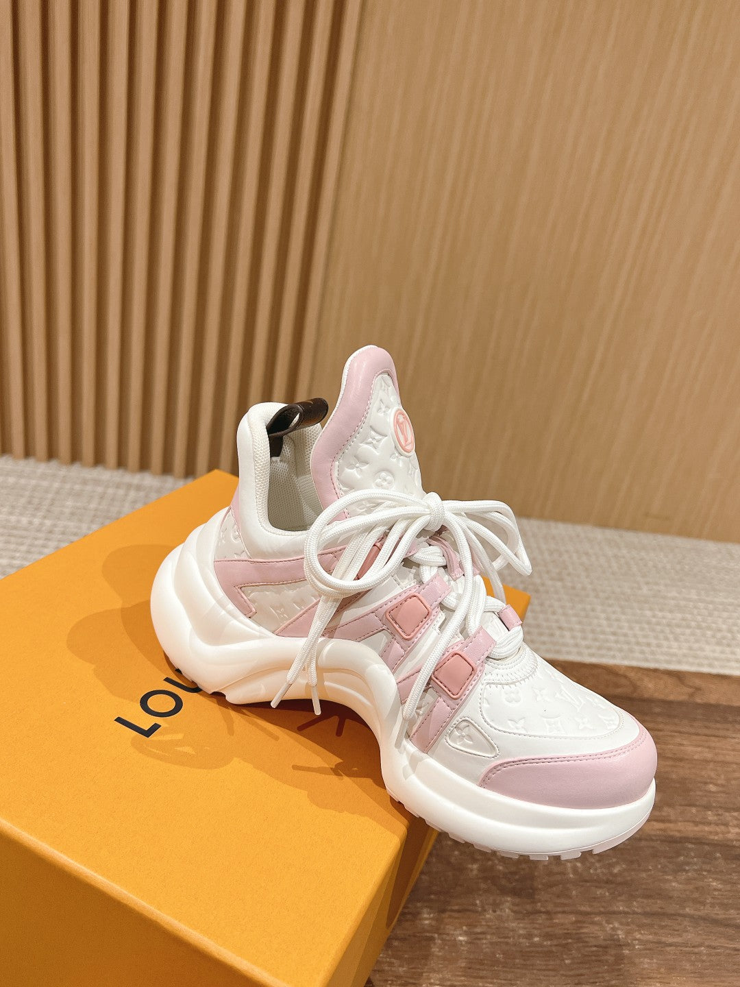 LV ARCHLIGHT SNEAKER IN WHITE MIX BABY PINK EMBOSSED CALFSKIN