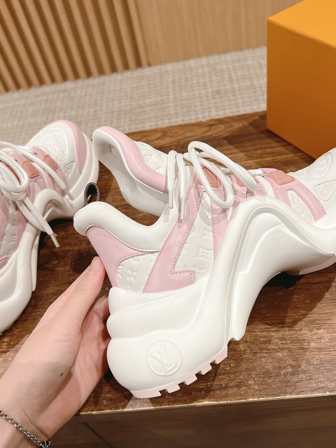 LV ARCHLIGHT SNEAKER IN WHITE MIX BABY PINK EMBOSSED CALFSKIN