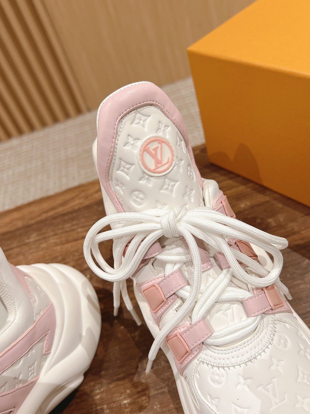 LV ARCHLIGHT SNEAKER IN WHITE MIX BABY PINK EMBOSSED CALFSKIN