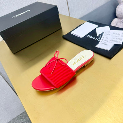 BOW SLIPPERS IN CANDY RED LAMBSKIN