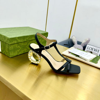 MEDIUM-HEEL SANDAL IN BLACK CALFSKIN GOLD HARDWARE WITH RHINSTONES