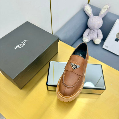 LOAFER WITH TRIANGLE LOGO IN COGNAC CALFSKIN