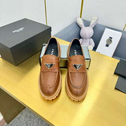 LOAFER WITH TRIANGLE LOGO IN COGNAC CALFSKIN