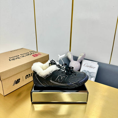 MIUXNB 530 SNEAKERS IN BLACK CALFSKIN SHEARLING