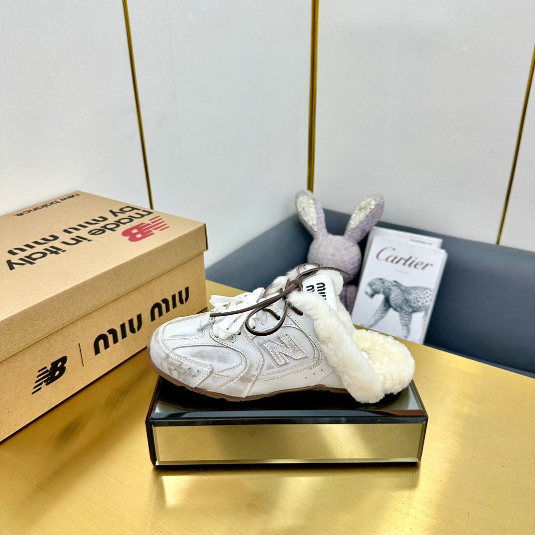 MIUxNB 530 SNEAKER MULES IN DISTRESSED WHITE CALFSKIN SHEARLING