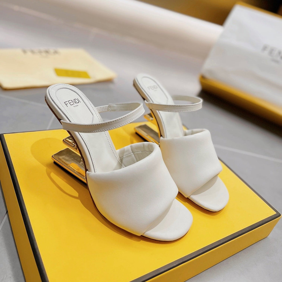 FENDI BAGUETTE HIGH-HEEL SANDALS 8 CM IN WHITE CALFSKIN