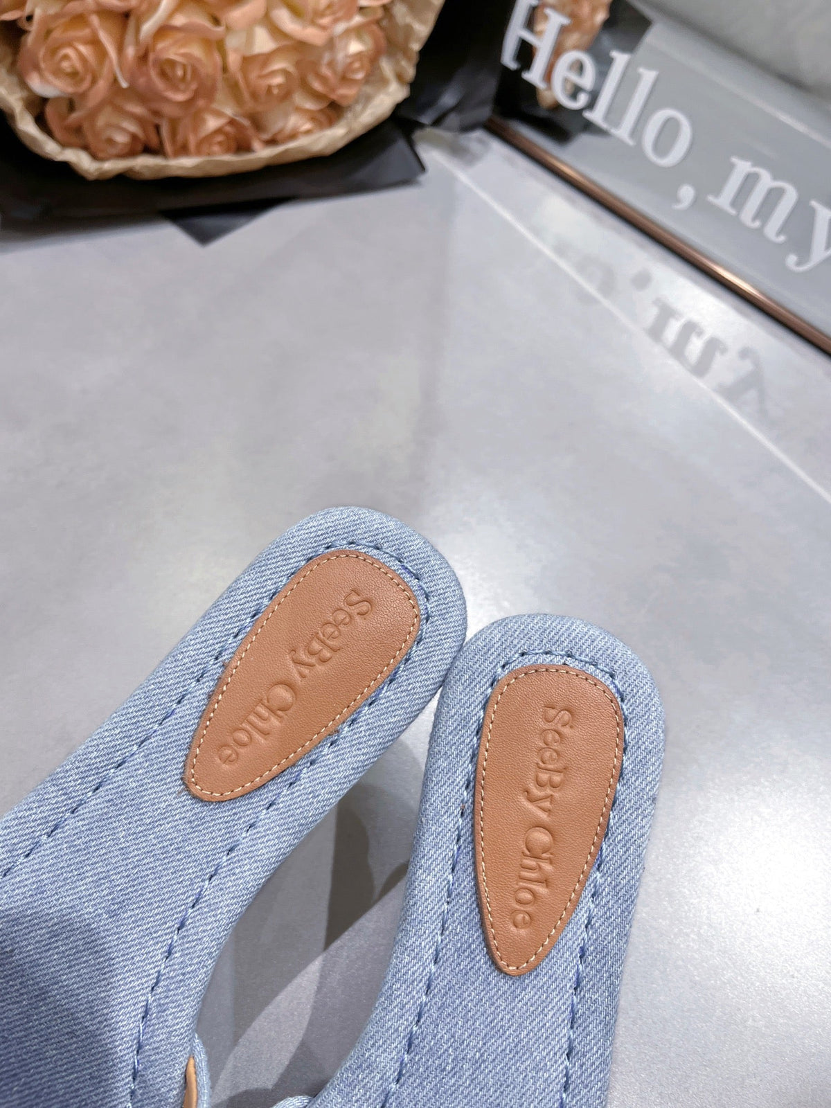 SLIDE MULE IN LIGHT BLUE DENIM AND BROWN CALFSKIN GOLD HARDWARE