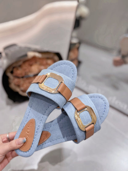 SLIDE MULE IN LIGHT BLUE DENIM AND BROWN CALFSKIN GOLD HARDWARE