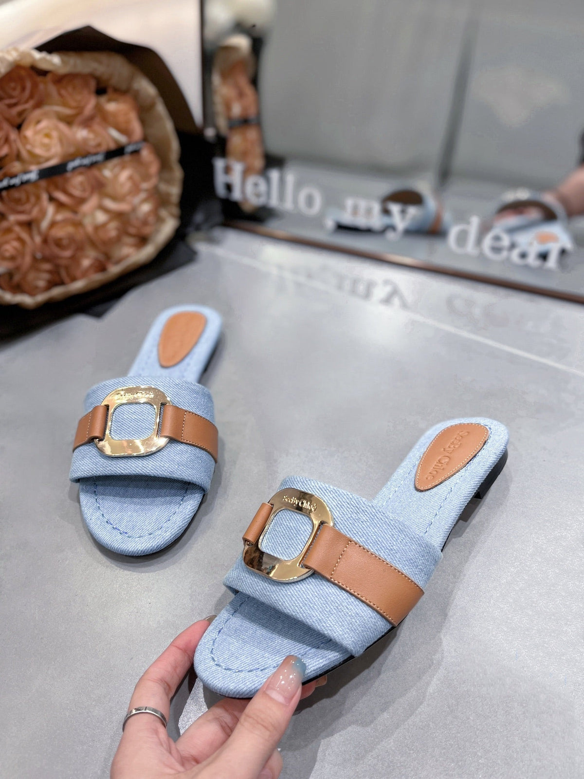 SLIDE MULE IN LIGHT BLUE DENIM AND BROWN CALFSKIN GOLD HARDWARE