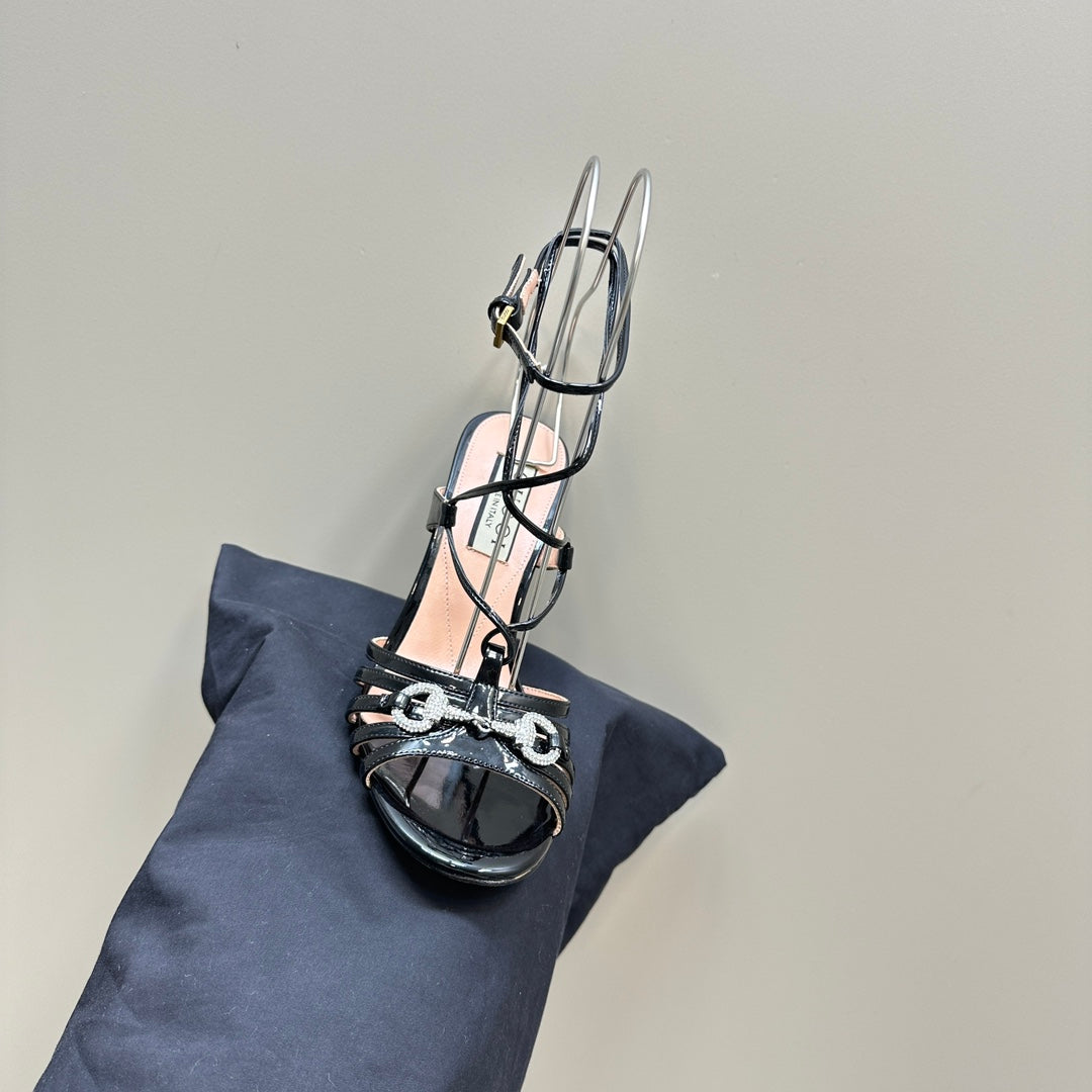 CRYSTAL HORSEBIT STRAPPY SANDAL 10.5CM IN BLACK PATENT LEATHER