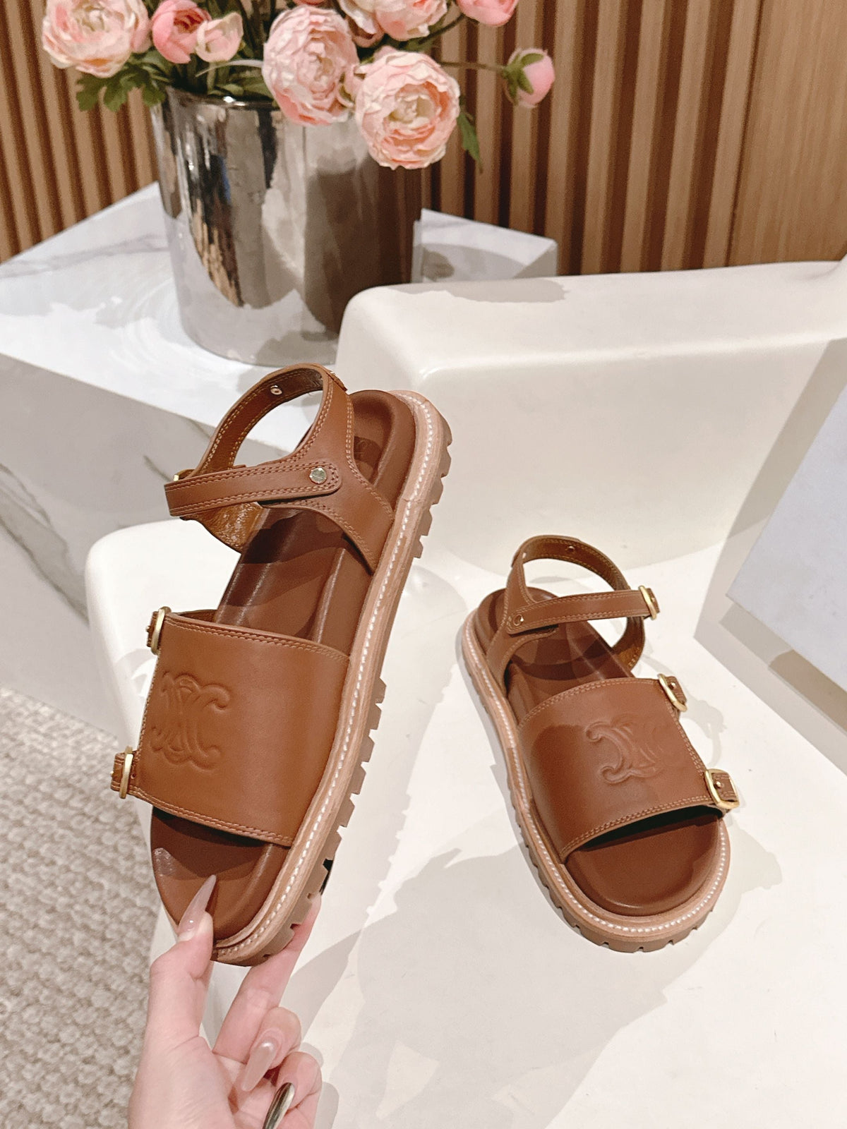 FLAT SANDALS IN RUST BROWN TRIOMPHE EMBOSSED SMOOTH CALFSKIN