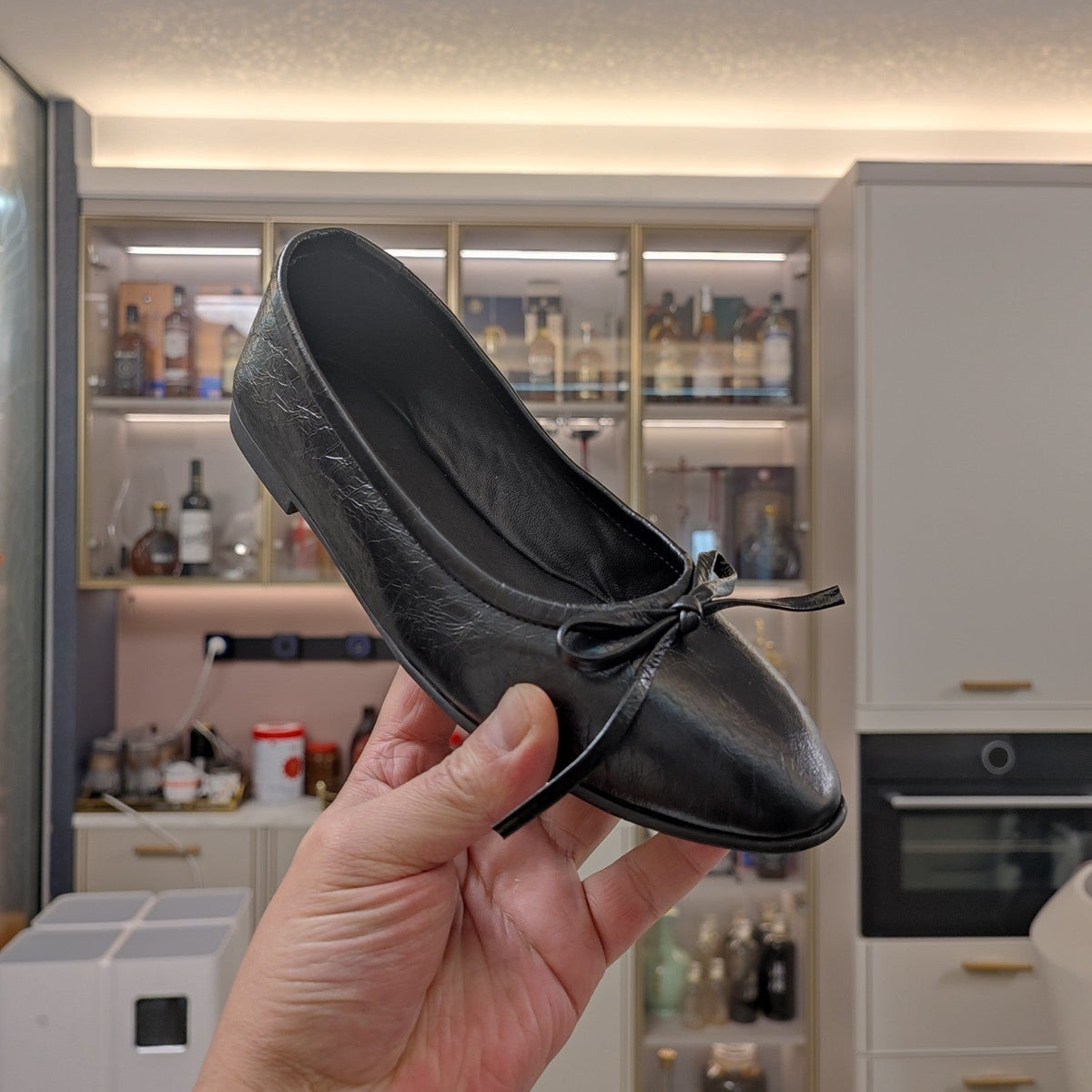 RHINESTONE BALLET FLATS WITH BOW IN BLACK WAX-OIL SHEEPSKIN
