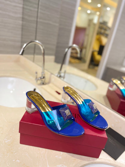 HIGH MULE 60MM IN COBALT BLUE SHEEPSKIN AND TRANSPARENT PVC