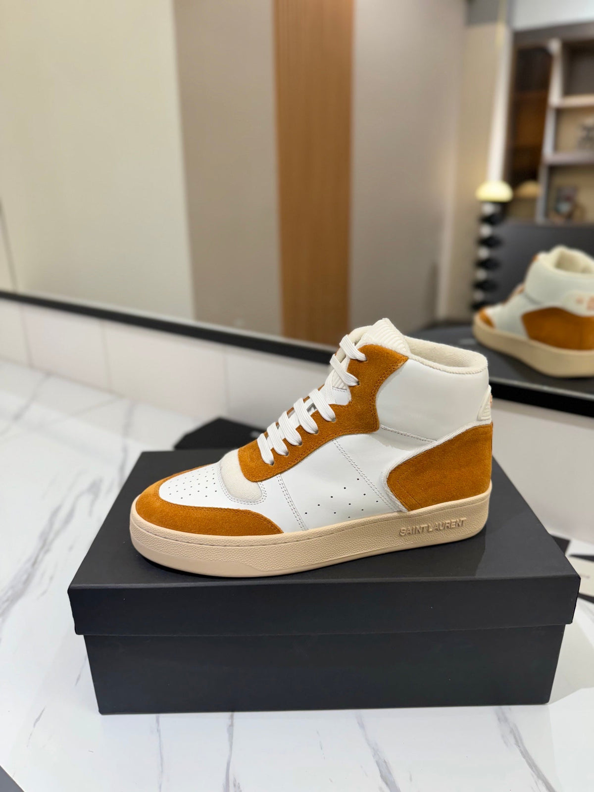 MID-TOP SNEAKERS IN WHITE PERFORATED LAMBSKIN AND BRONZE ORANGE SUEDE
