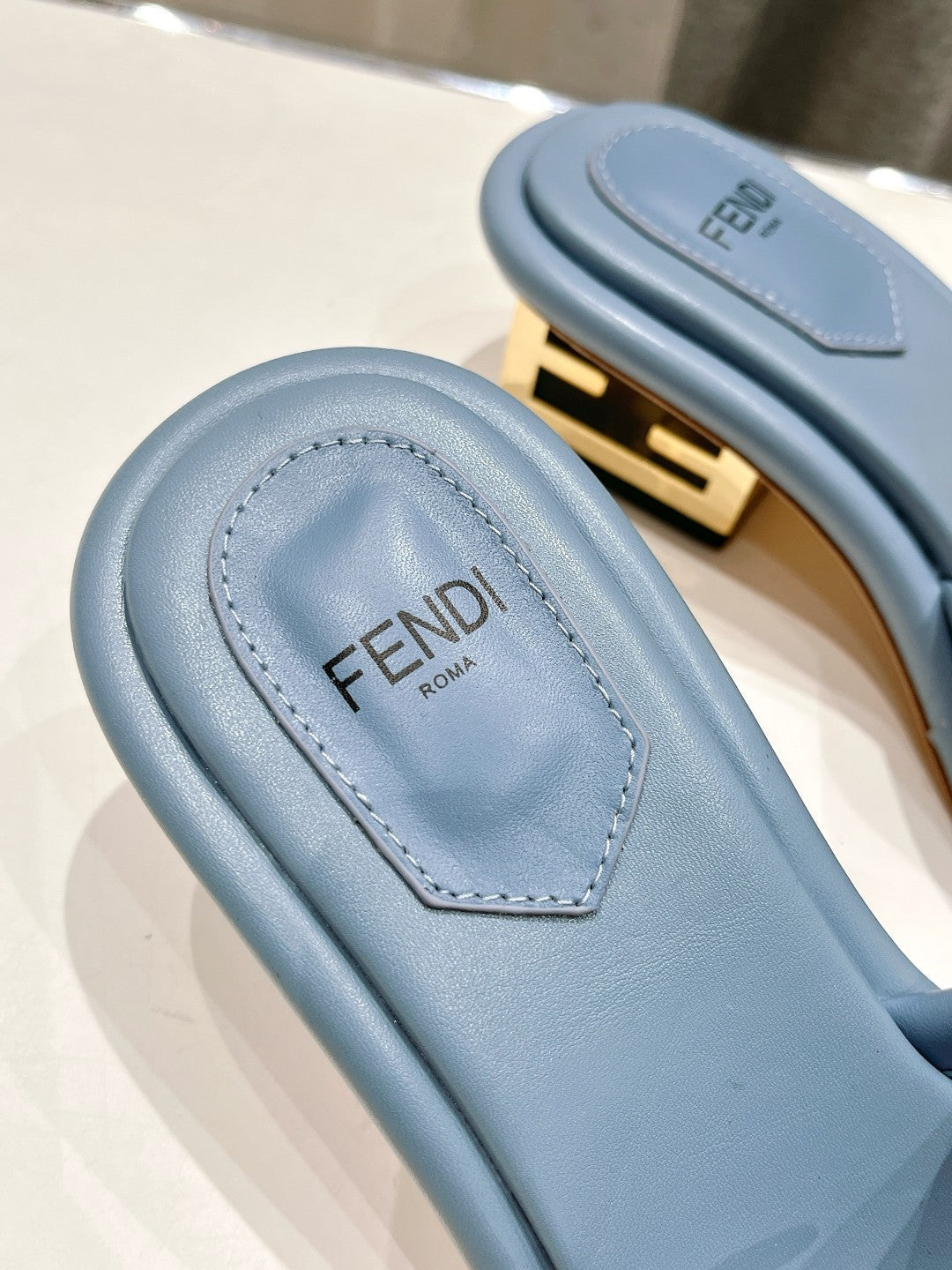 FENDI BAGUETTE MEDIUM-HEEL SANDALS 45 MM IN CERULEAN BLUE CALFSKIN