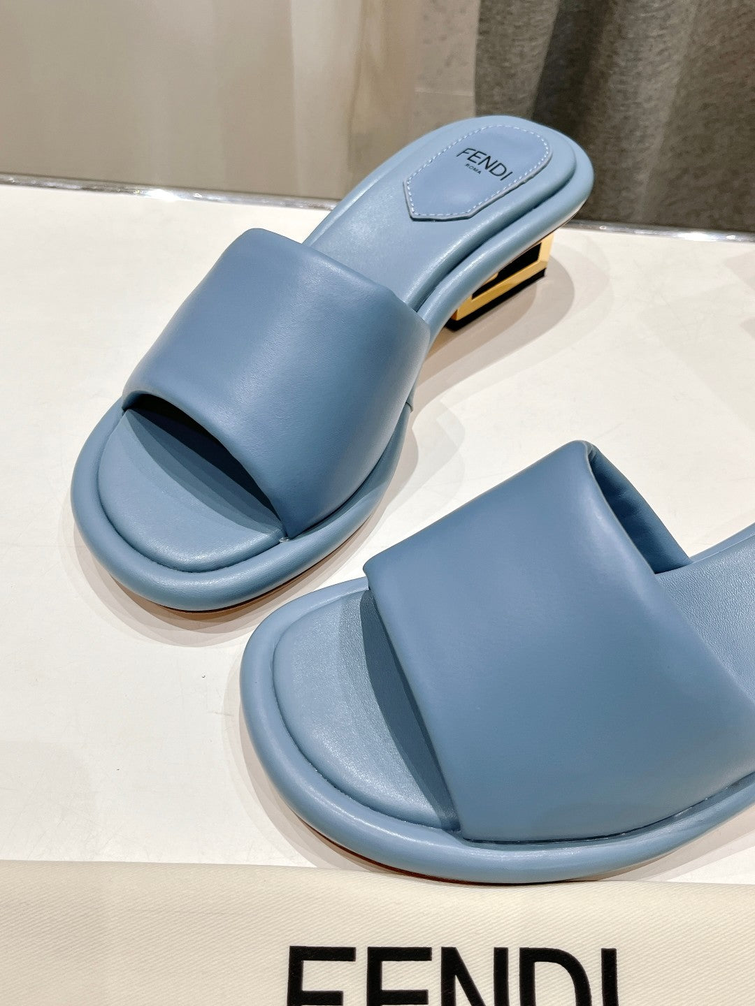 FENDI BAGUETTE MEDIUM-HEEL SANDALS 45 MM IN CERULEAN BLUE CALFSKIN