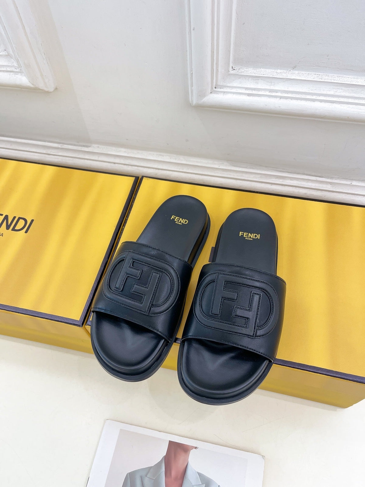 FENDI LOGO SLIDES IN BLACK CALFSKIN