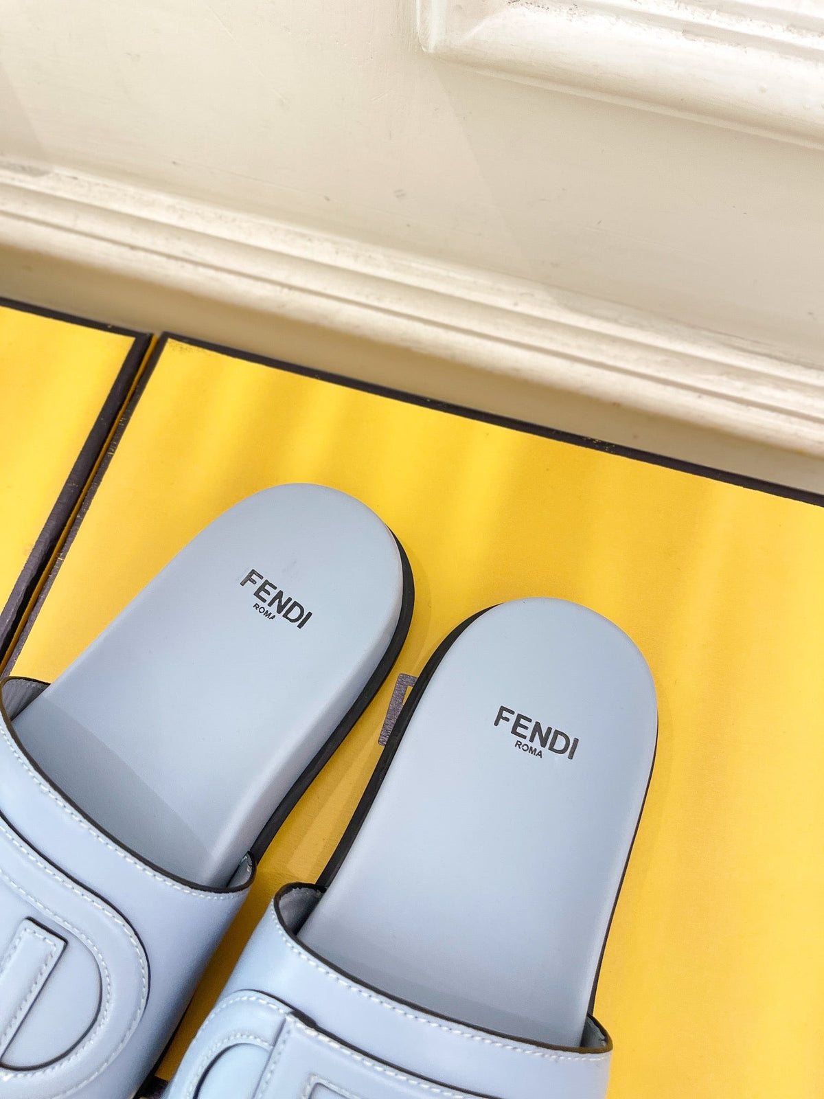 FENDI LOGO SLIDES IN BLUE POWDER CALFSKIN