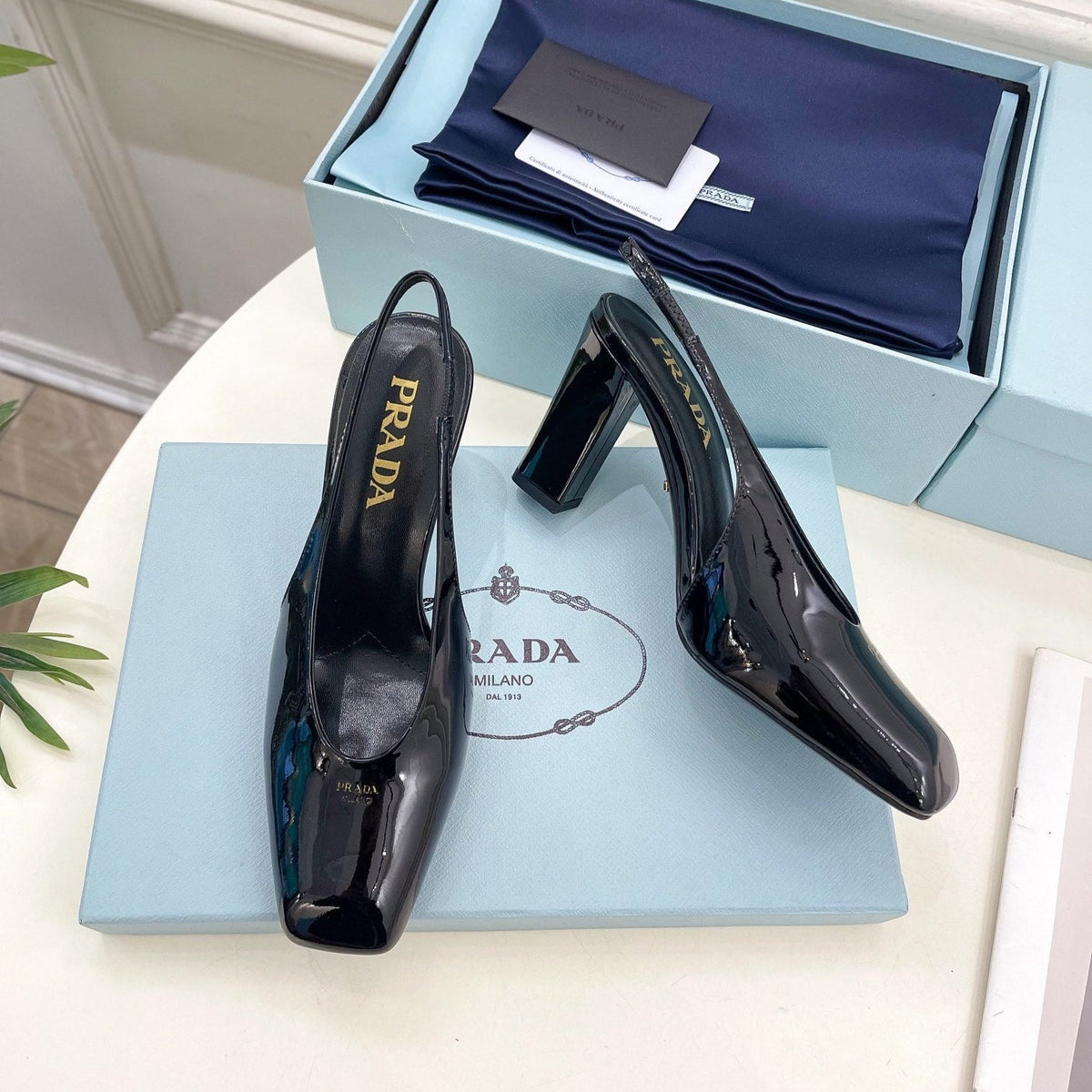 SQUARE TOE SLINGBACK PUMPS IN BLACK GLOSSY CALFSKIN