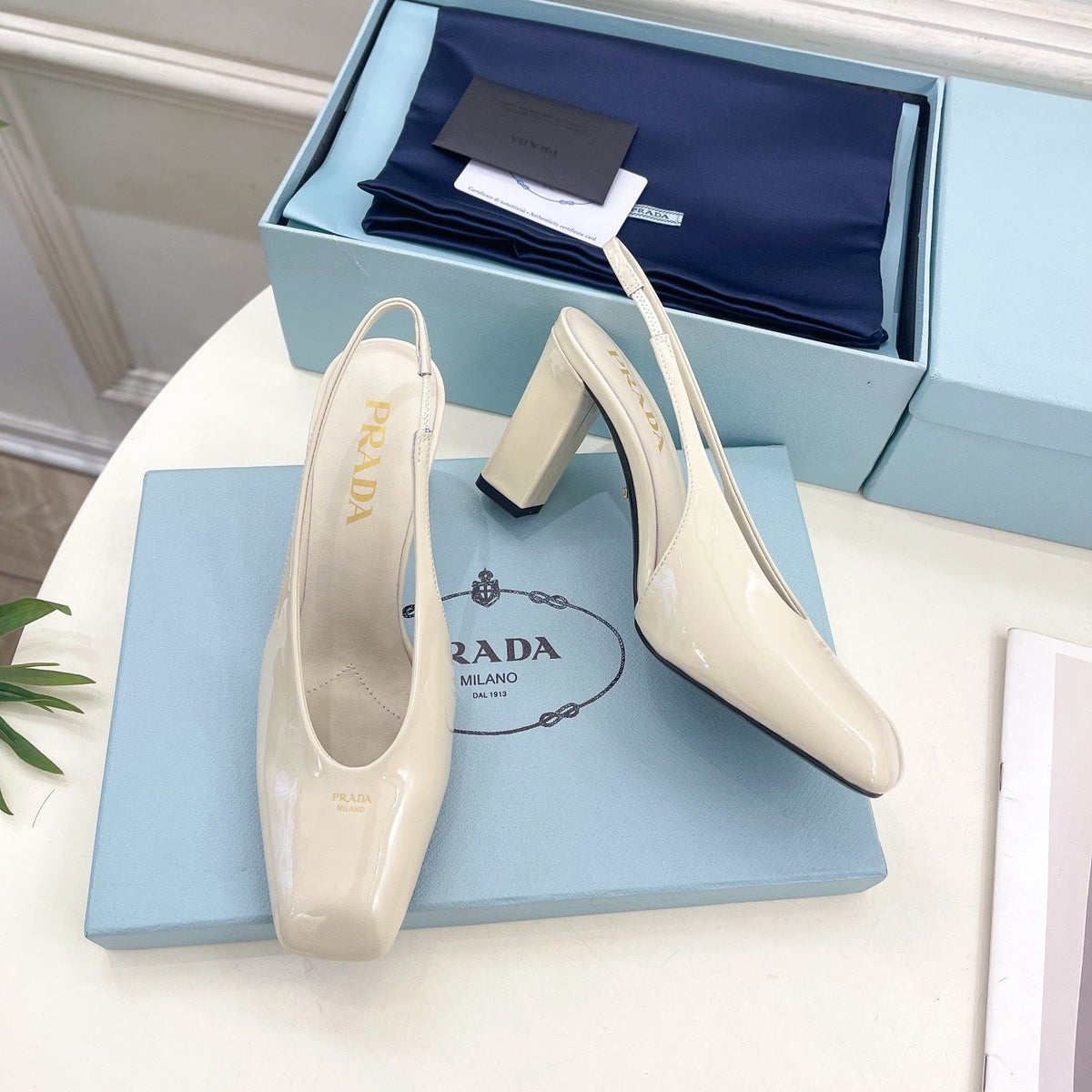 SQUARE TOE SLINGBACK PUMPS IN WHITE GLOSSY CALFSKIN