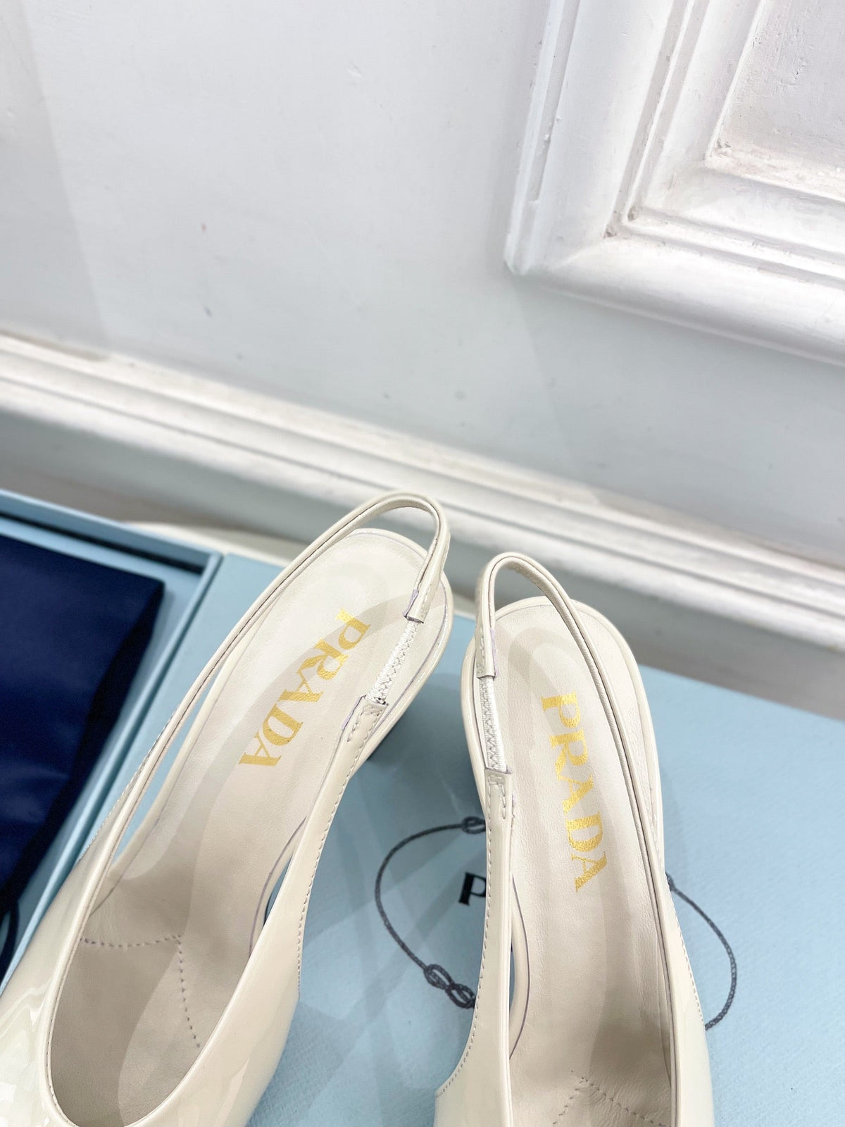 SQUARE TOE SLINGBACK PUMPS IN WHITE GLOSSY CALFSKIN
