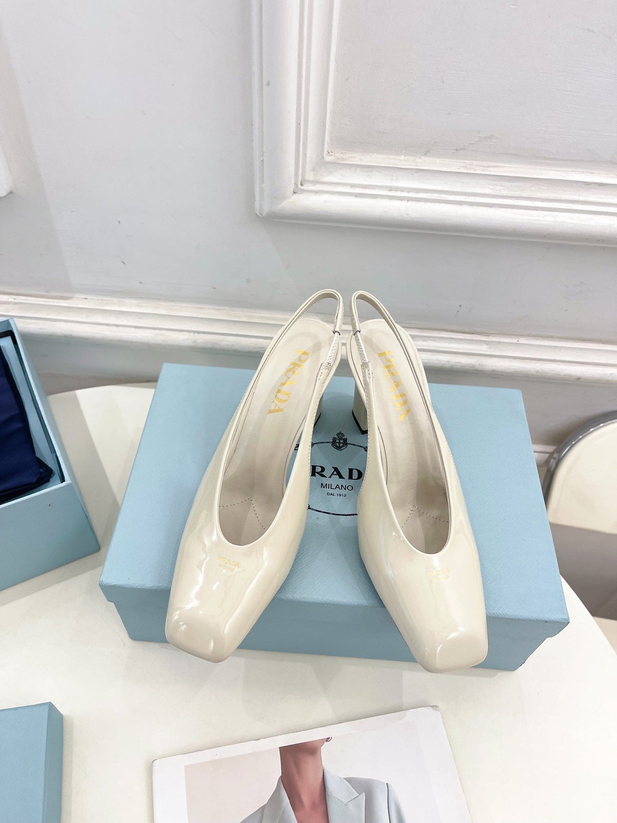 SQUARE TOE SLINGBACK PUMPS IN WHITE GLOSSY CALFSKIN