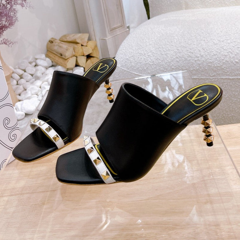 ROCKSTUD TOWER-HEEL MULES IN BLACK CALFSKIN 7 CM