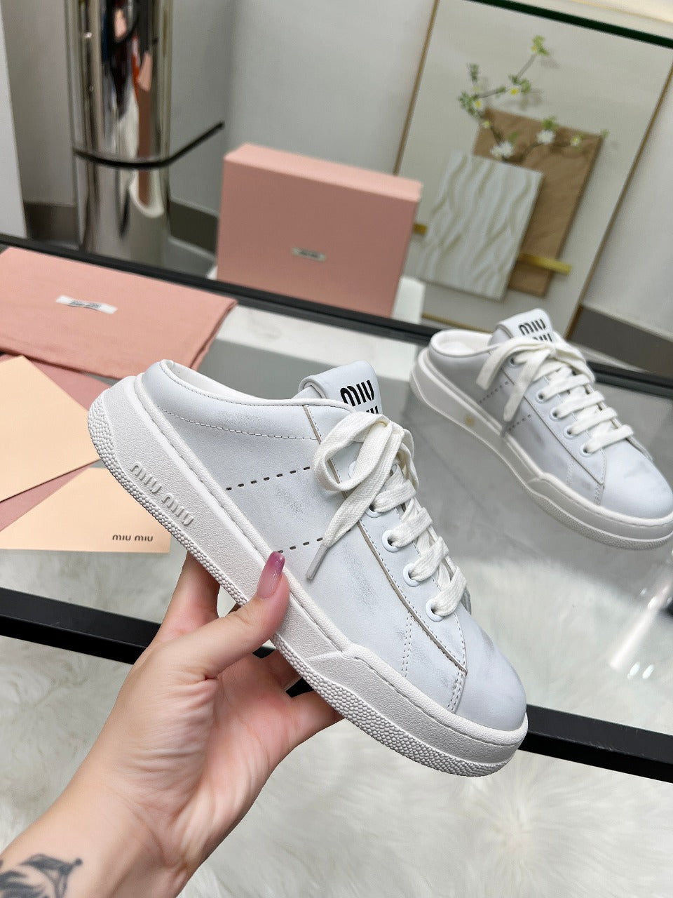 SNEAKER MULES IN WHITE BLEACHED CALFSKIN
