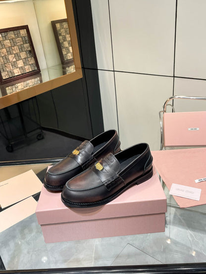 PENNY LOAFERS IN BLACK WITH A RED UNDERTONE CALFSKIN